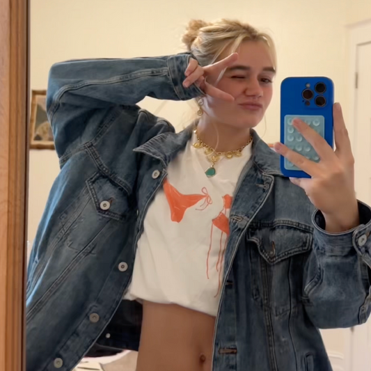White baby tee with orange bikini graphic, Y2K-inspired summer crop top for women, soft cotton beach shirt – Gracey Jeans